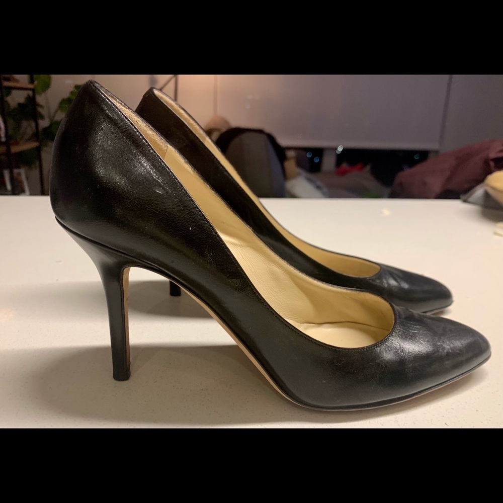 Jimmy Choo black leather pumps